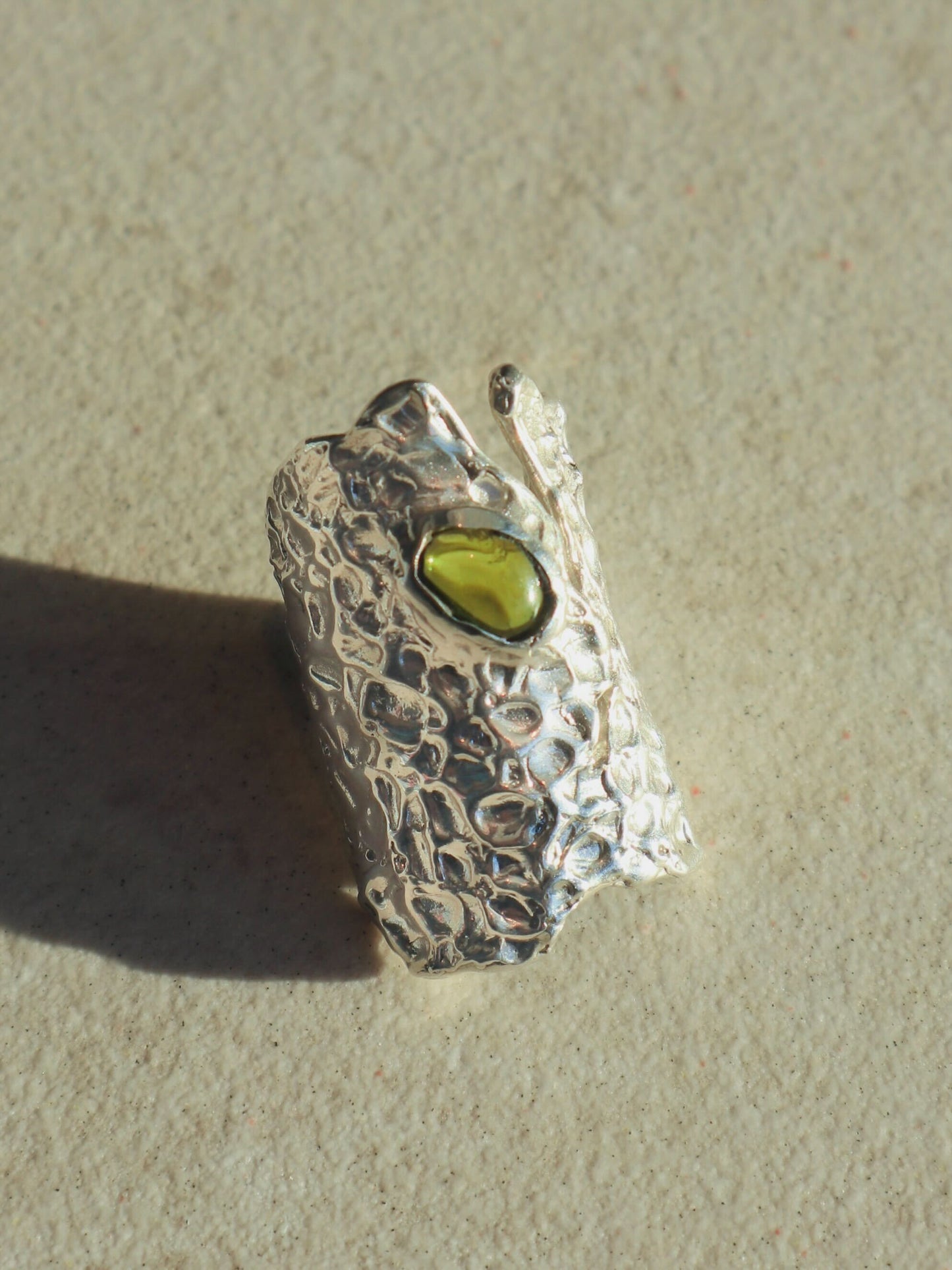 Raw Peridot Ring, Currently on display at Lewis Gallery